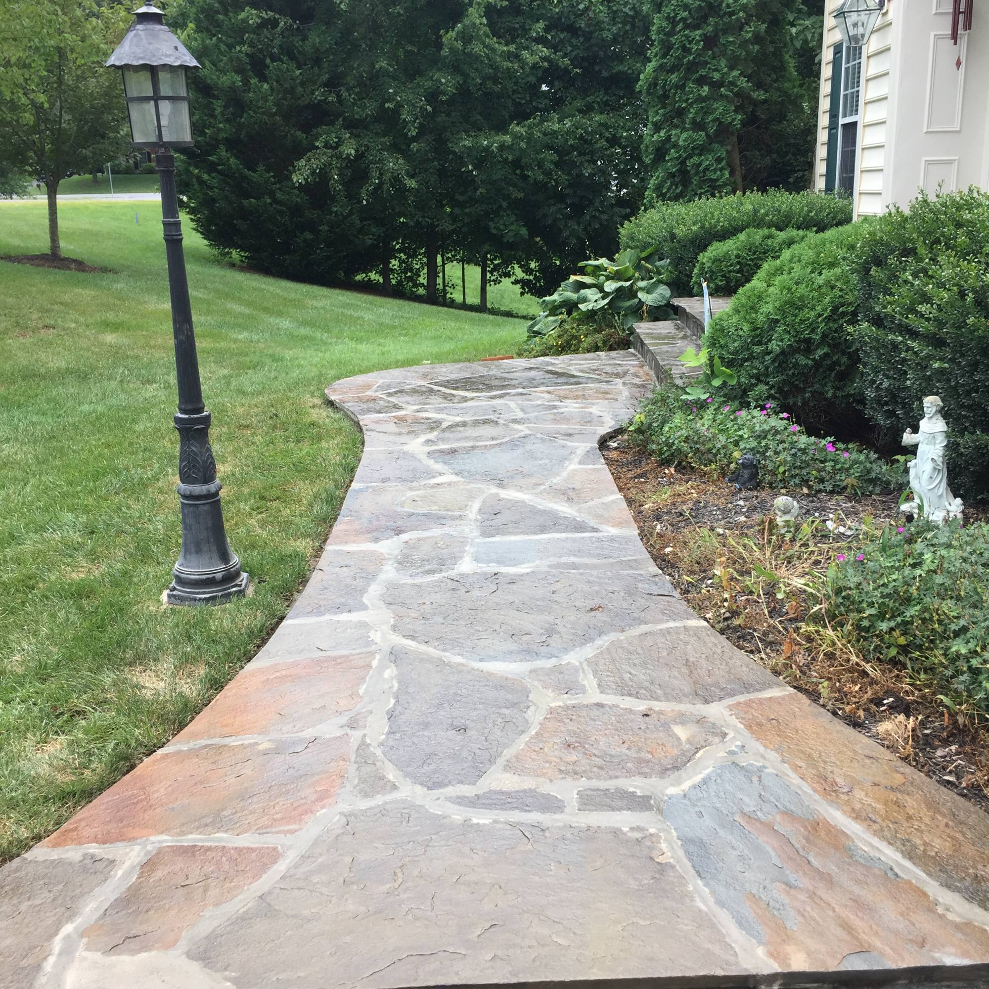 Irregular flagstone walkway with lamppost and landscaping in Northern Virginia